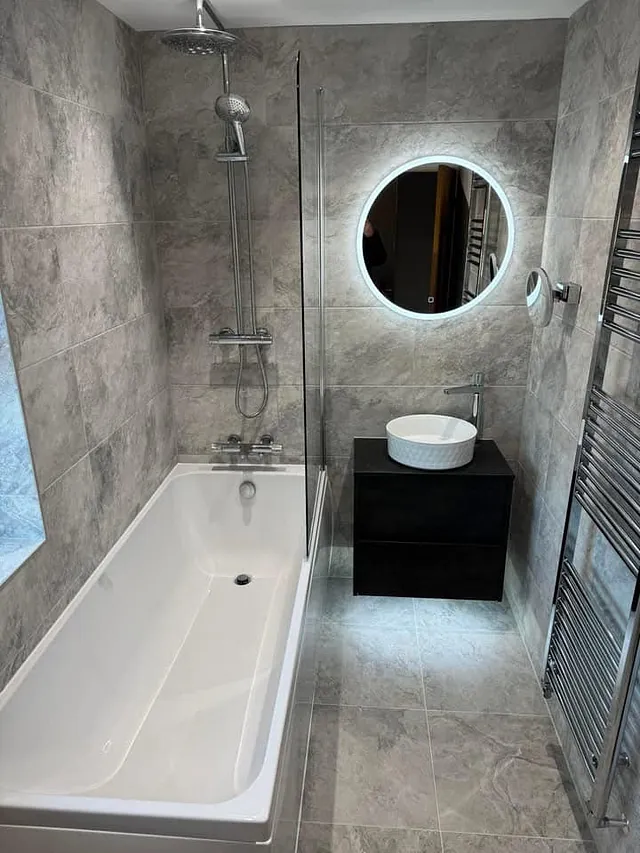 Grey marble tiles on walls and floor